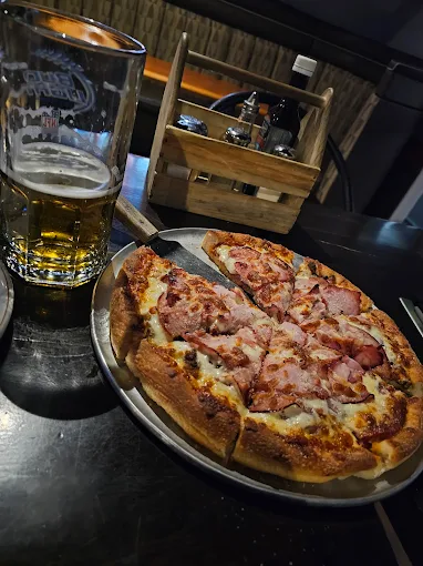 Meat Lovers at TOPS Pizza & Sports Bar, Calgary
